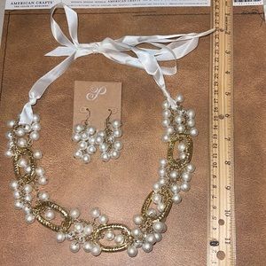 Plunder pearl necklace with ribbon detail and matching earring set.